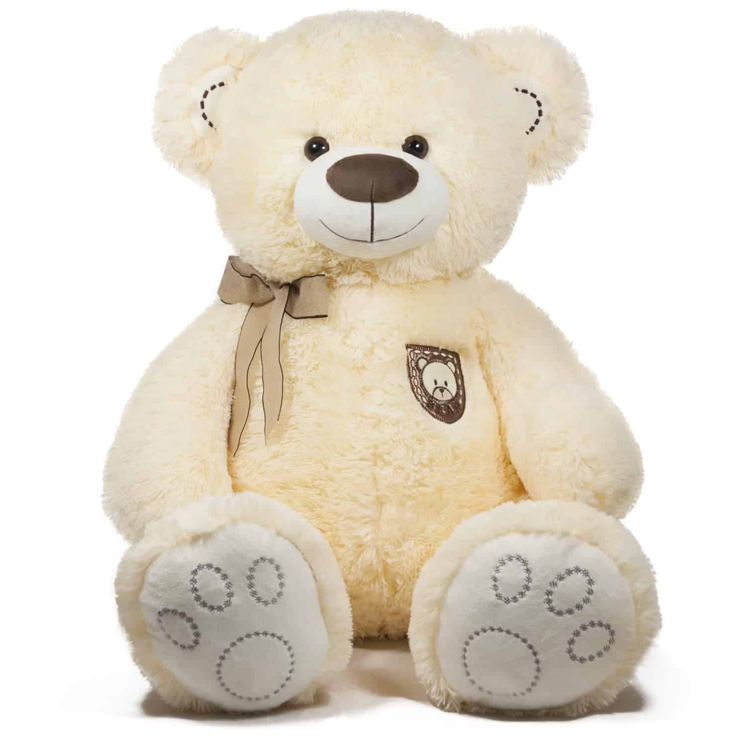 Мека пухкава плюшена мечка с каиш към врата, подходяща за детски партита и подаръци, от колекцията на Party Deluxe за празнични събития.