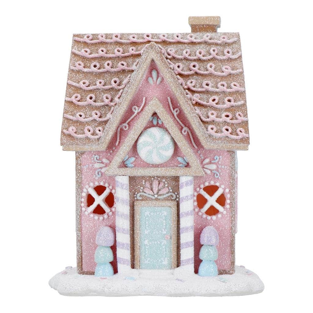 Коледна украса за сладки, вкусна къща от джинджифил със снежна декорация и весела празнична атмосфера, идеална за коледно парти или украса в зимния сезон.