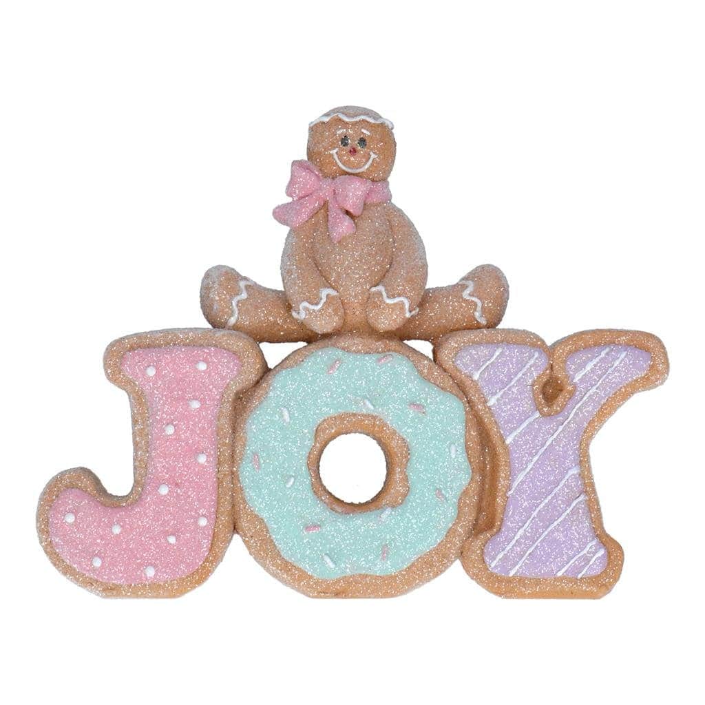 цветя бисквитки с буквите JOY и меденки за Коледа, празнични сладки курабии, декорирани с захарна глазура и цветни сладки, подходящи за коледни партита и украса, сладки коледни колаби от Party Deluxe.